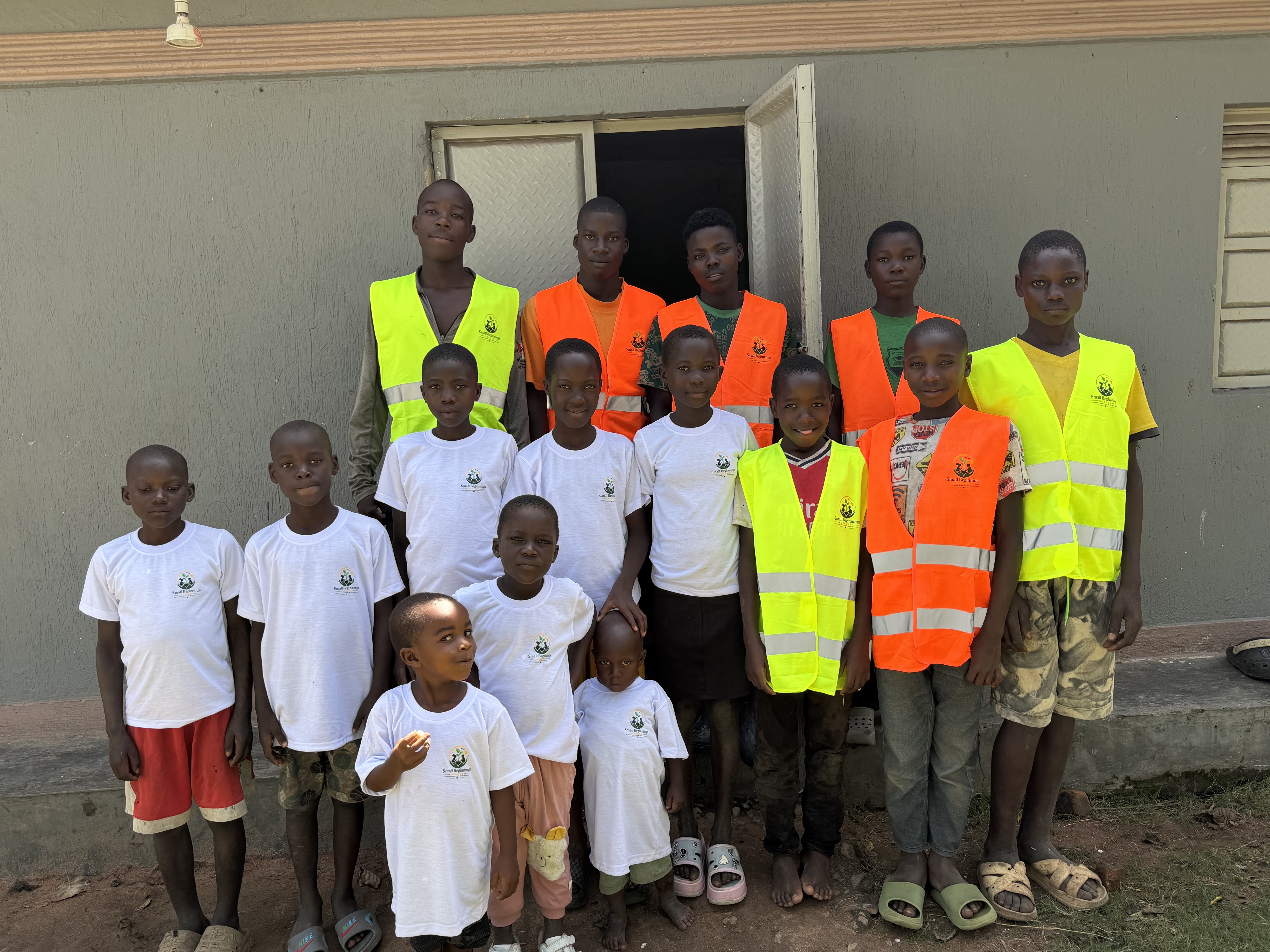 Community volunteers and students in Uganda