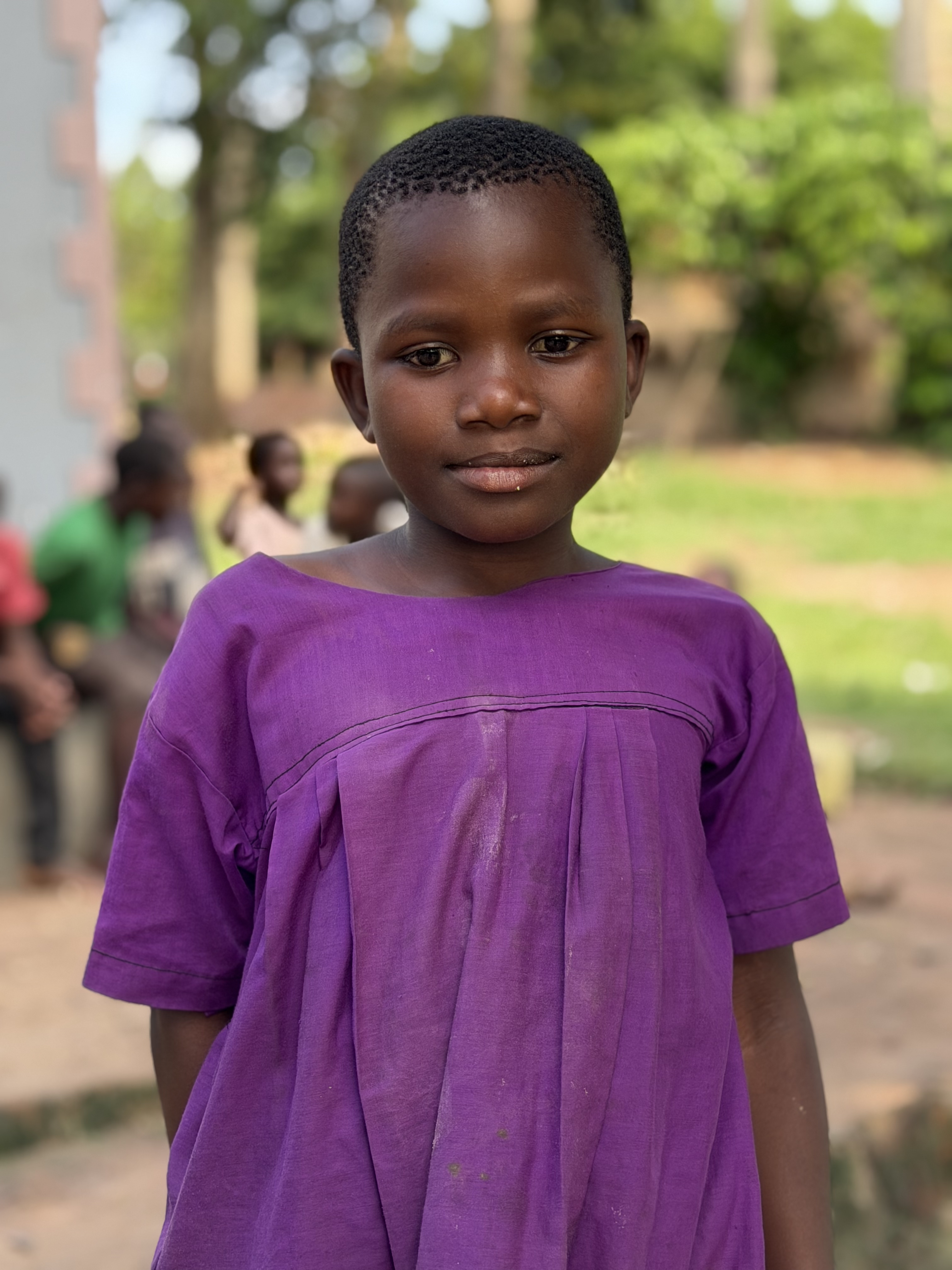 Child portrait with a warm outdoor backdrop